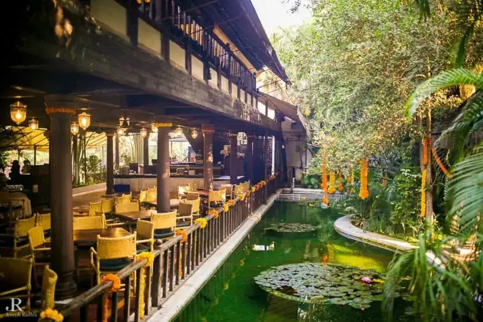 Restaurant deck overlooking the lily pond at Exotica Tropical Retreat